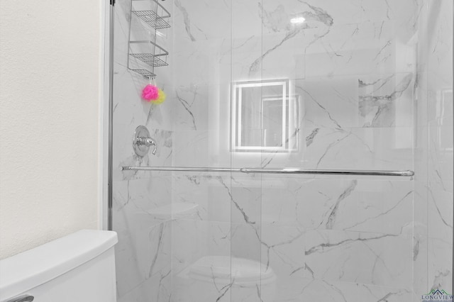 1208 Westwood Dr, Henderson, TX 75654 - bathroom with toilet, a textured wall, and a marble finish shower