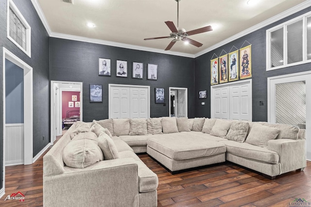 1208 Westwood Dr, Henderson, TX 75654 - living room featuring a ceiling fan, crown molding, and dark wood-type flooring