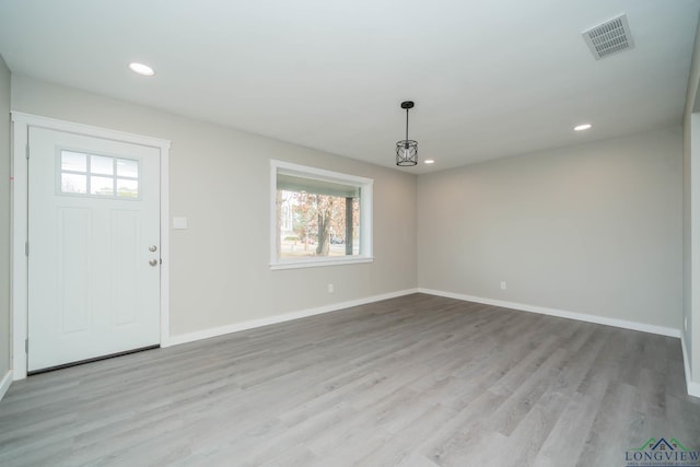 entrance foyer with light wood-type flooring