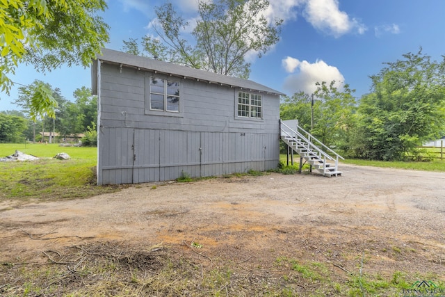2820 W Upshur Ave, Gladewater, TX 75647 - view of property exterior featuring stairs