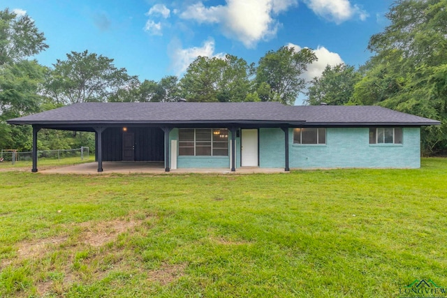 2820 W Upshur Ave, Gladewater, TX 75647 - view of front of home with a carport and brick siding