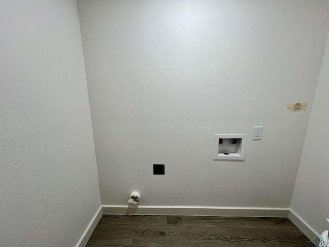 washroom featuring washer hookup and dark wood-type flooring