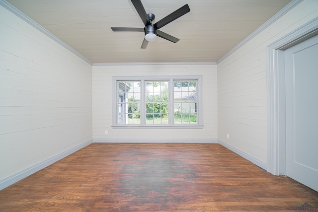 unfurnished room with ceiling fan, dark hardwood / wood-style flooring, and ornamental molding