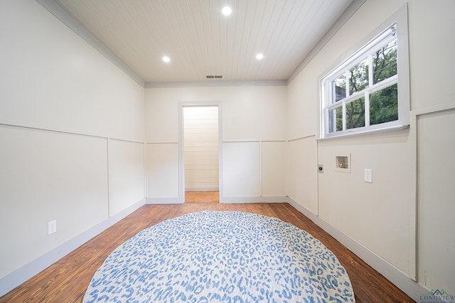 spare room with wood-type flooring