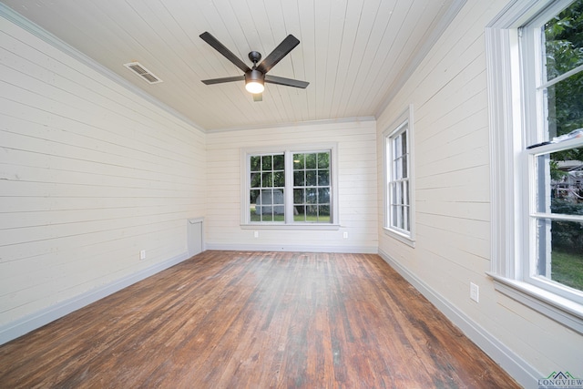 unfurnished sunroom with ceiling fan and wooden ceiling