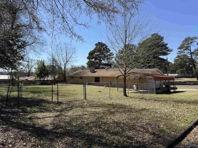 view of yard with a gate and fence