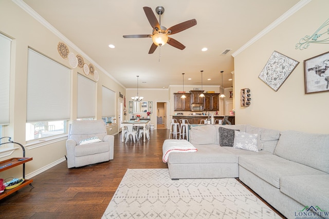 living room featuring ceiling fan, crown molding, and dark hardwood / wood-style floors