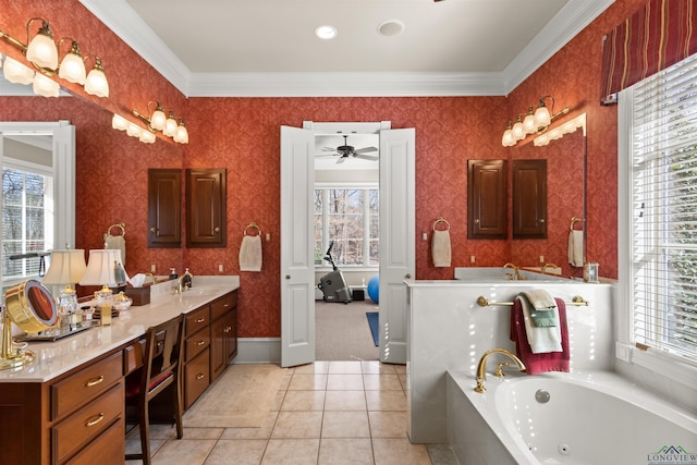 bathroom featuring tile patterned flooring, vanity, ornamental molding, and a washtub