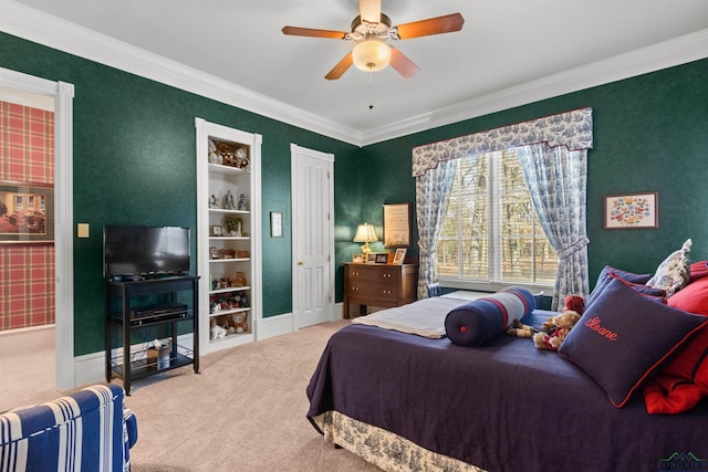 bedroom featuring ornamental molding, carpet floors, and ceiling fan