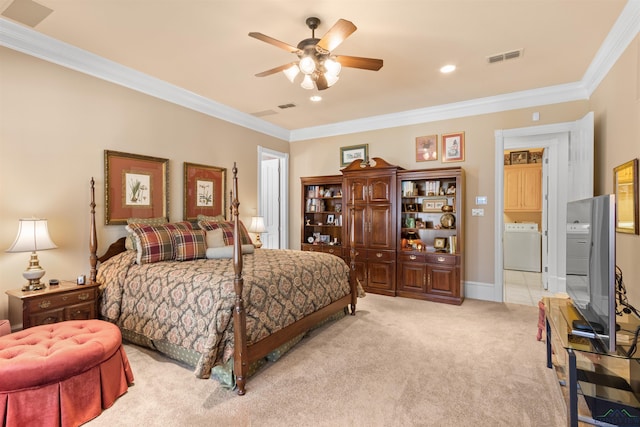 carpeted bedroom featuring ceiling fan, ornamental molding, and washer / dryer