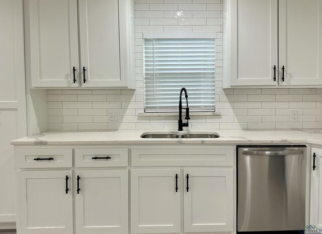 209 E Edgefield Ave, Longview, TX 75602 - kitchen featuring dishwasher, white cabinets, backsplash, and light stone counters