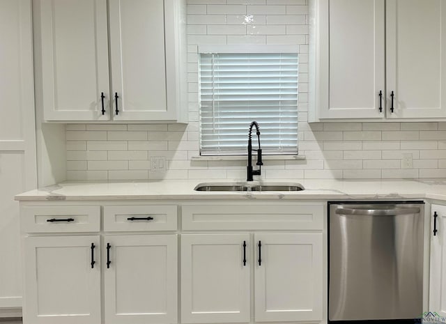 209 E Edgefield Ave, Longview, TX 75602 - kitchen featuring dishwasher, white cabinets, backsplash, and light stone counters