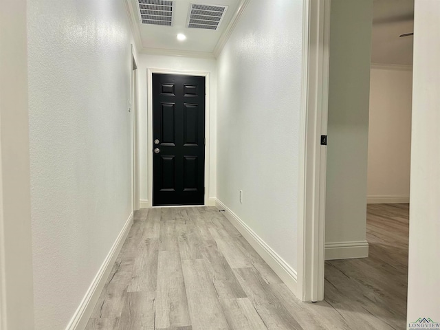 209 E Edgefield Ave, Longview, TX 75602 - hallway with crown molding and light wood finished floors