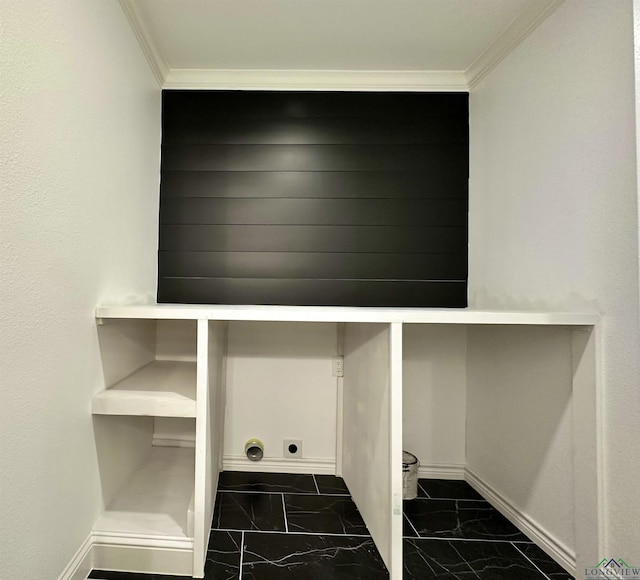 209 E Edgefield Ave, Longview, TX 75602 - laundry view of crown molding and baseboards