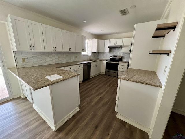 kitchen featuring stainless steel range with electric stovetop, black dishwasher, and white cabinets