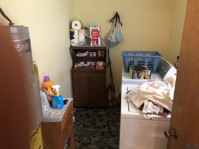 clothes washing area with washer and clothes dryer