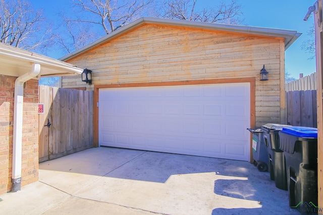 detached garage with fence