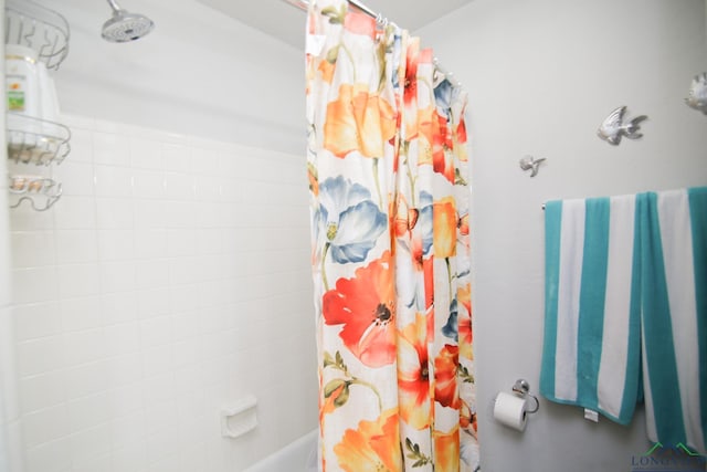 full bathroom with shower / tub combo