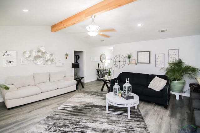 living area featuring vaulted ceiling with beams, recessed lighting, visible vents, a ceiling fan, and wood finished floors