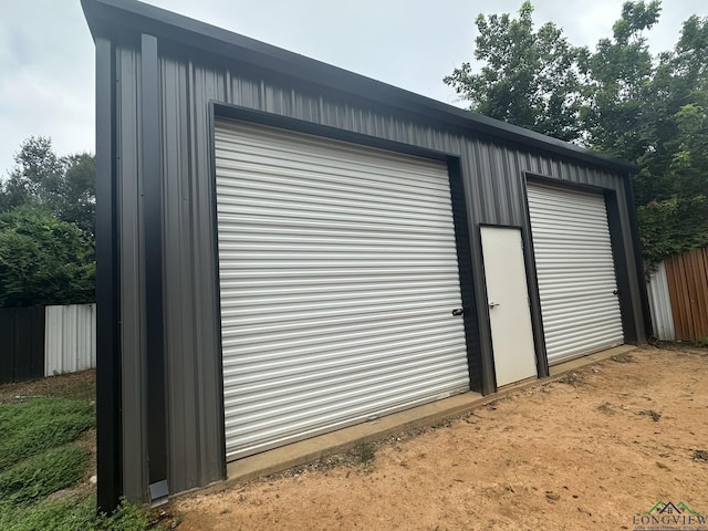 view of outdoor structure featuring a garage