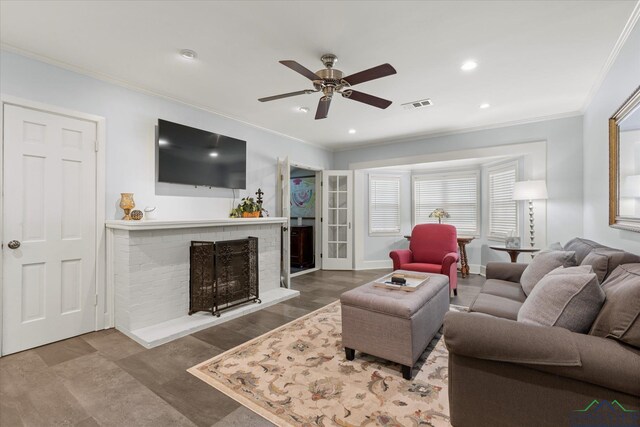 204 Delwood Dr, Longview, TX 75605 - living area with crown molding, a fireplace, ceiling fan, recessed lighting, and baseboards