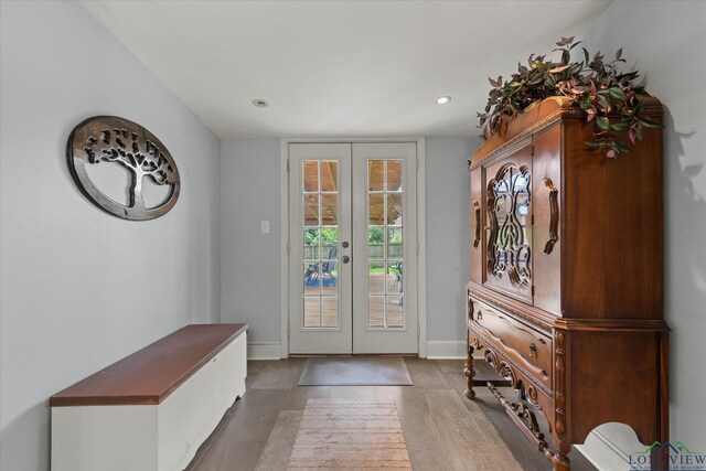 204 Delwood Dr, Longview, TX 75605 - doorway to outside featuring french doors, baseboards, recessed lighting, and wood finished floors