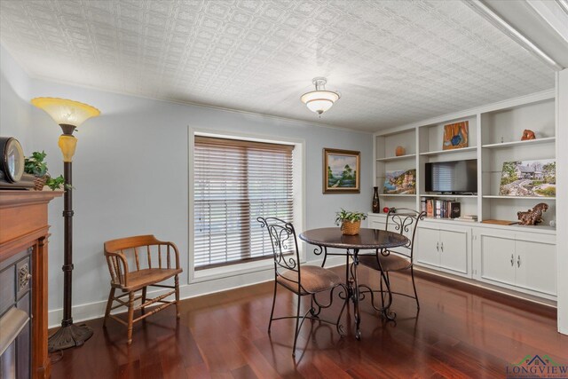 204 Delwood Dr, Longview, TX 75605 - dining area featuring dark wood-style floors, baseboards, and ornamental molding