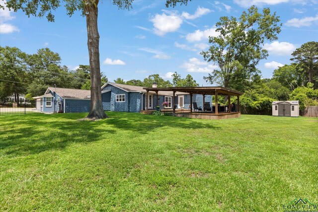 204 Delwood Dr, Longview, TX 75605 - back of house with a deck and a chimney