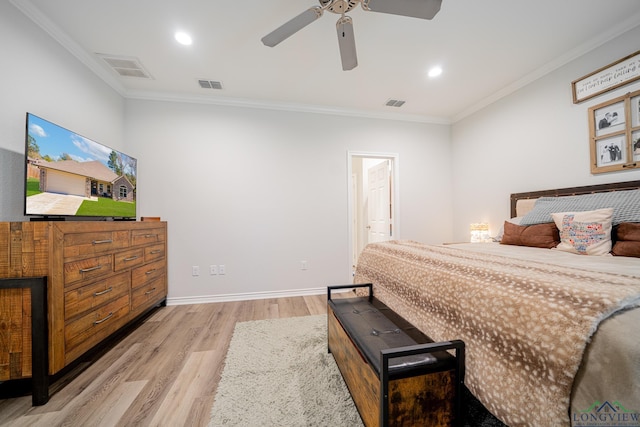 bedroom with ceiling fan, crown molding, and light hardwood / wood-style floors