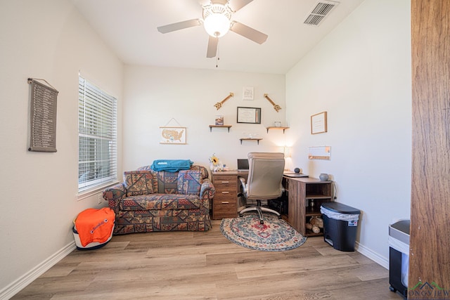 office with ceiling fan and hardwood / wood-style floors