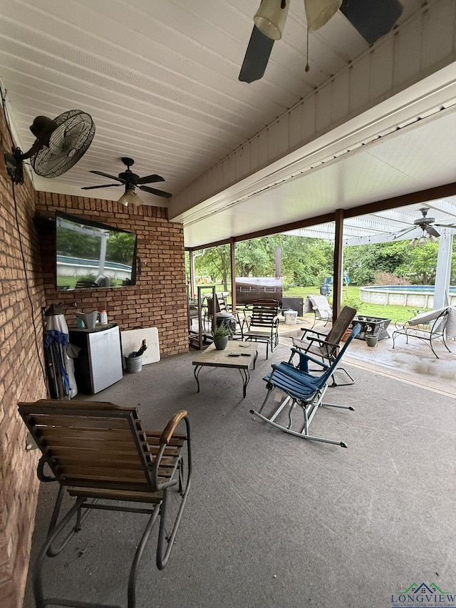 302 Meadowbrook Ln, Ore City, TX 75683 - view of patio / terrace with a ceiling fan and a swimming pool