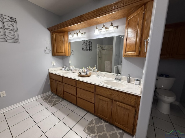 302 Meadowbrook Ln, Ore City, TX 75683 - full bath with toilet, a stall shower, tile patterned flooring, double vanity, and baseboards