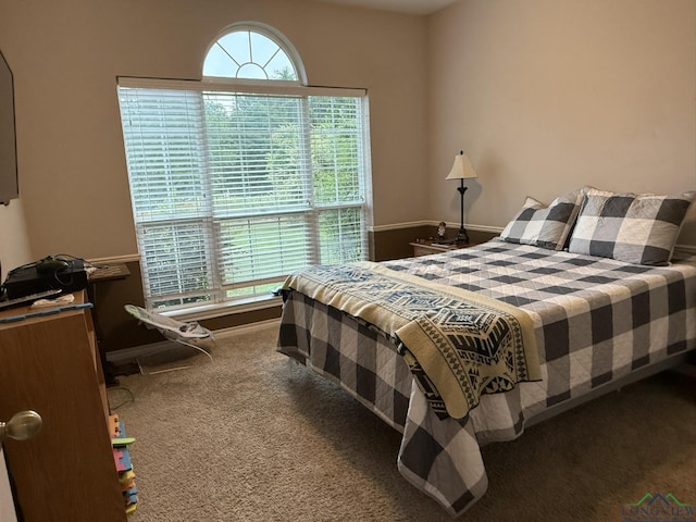 302 Meadowbrook Ln, Ore City, TX 75683 - carpeted bedroom featuring baseboards
