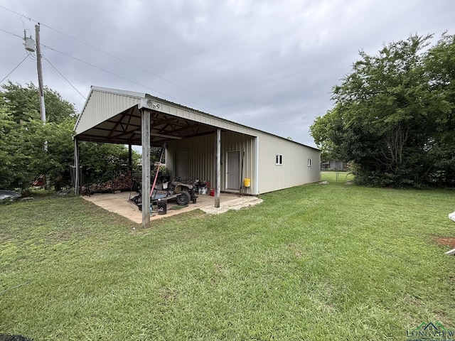 302 Meadowbrook Ln, Ore City, TX 75683 - view of grassy yard with an outbuilding