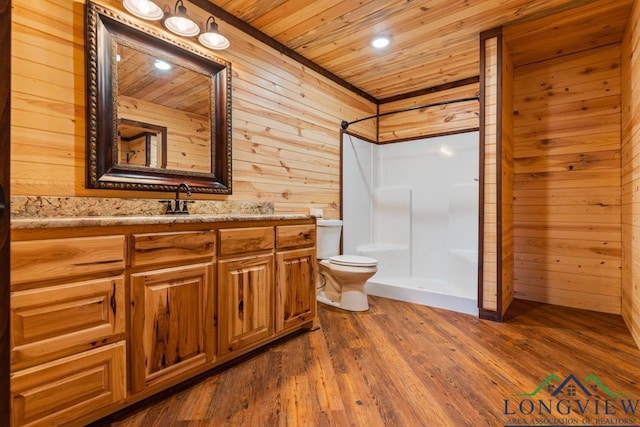 bathroom featuring toilet, wood finished floors, wooden walls, a shower, and wood ceiling