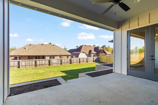 view of patio with ceiling fan and french doors