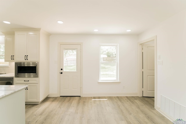 doorway featuring light hardwood / wood-style flooring