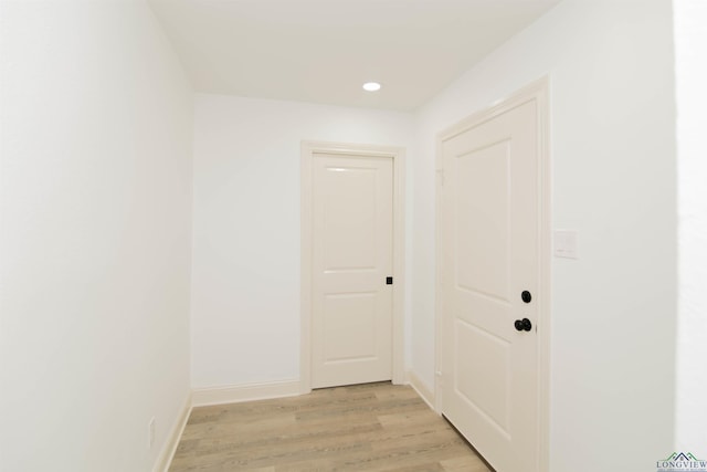 hallway featuring light wood-type flooring