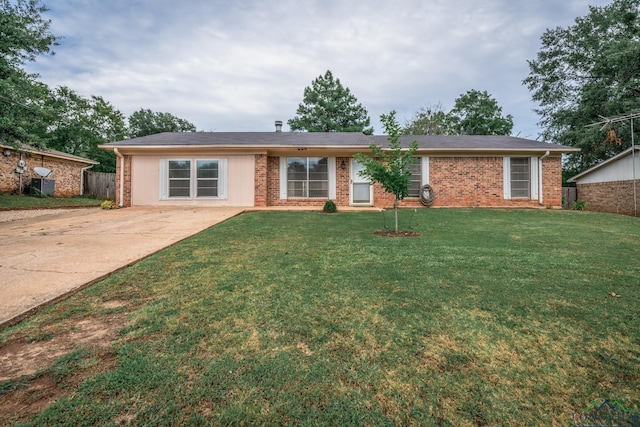 ranch-style house with a front yard