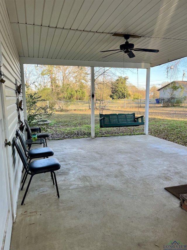 view of patio featuring ceiling fan