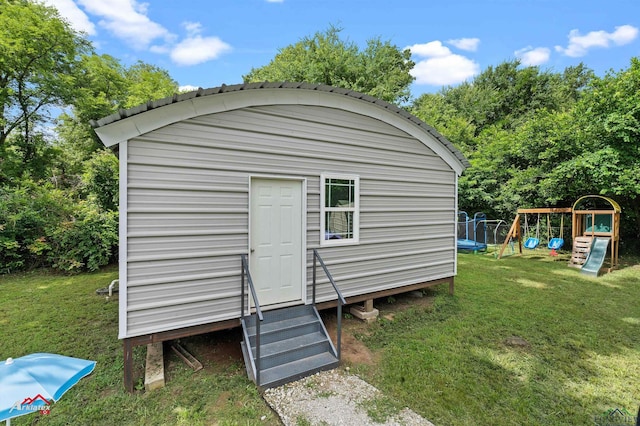 102 Poplar St, Marshall, TX 75670 - view of outbuilding featuring entry steps and a playground