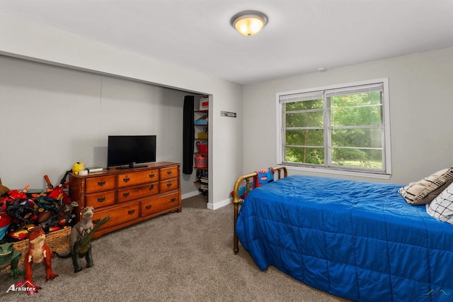 102 Poplar St, Marshall, TX 75670 - bedroom with carpet and baseboards
