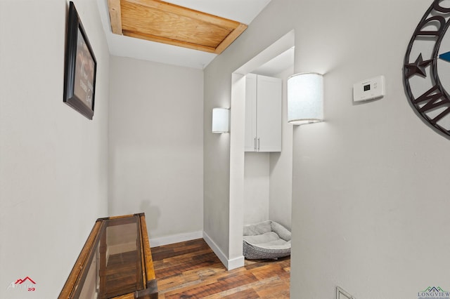 102 Poplar St, Marshall, TX 75670 - corridor with wood finished floors and baseboards