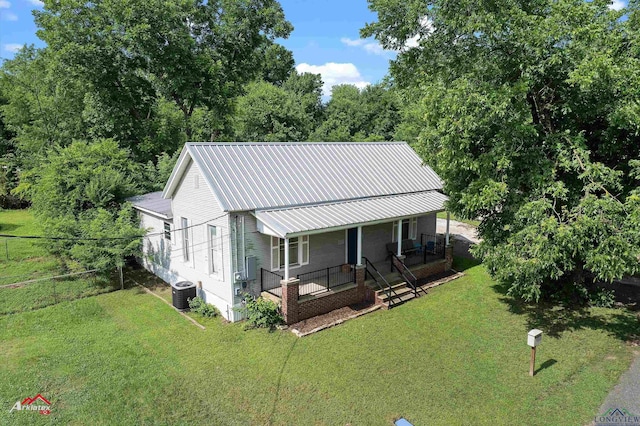 102 Poplar St, Marshall, TX 75670 - view of front of property featuring a porch and a metal roof