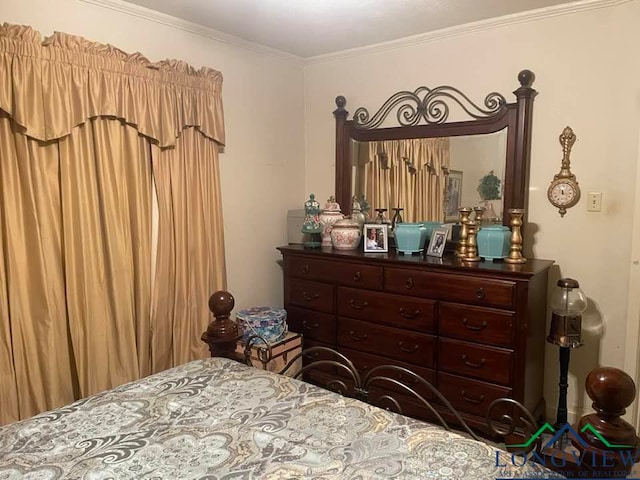 bedroom with crown molding