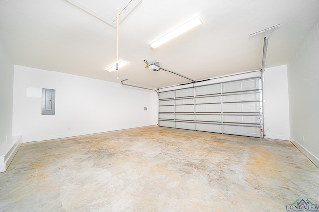 garage featuring electric panel and a garage door opener