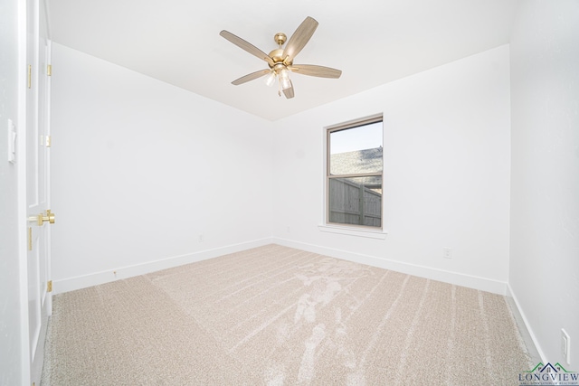 unfurnished room with ceiling fan and carpet floors