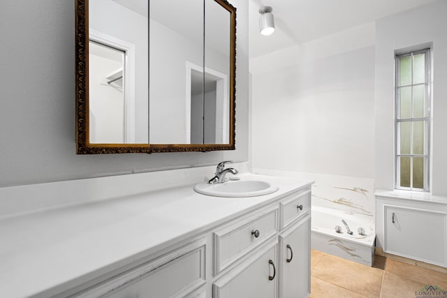 4 Briar Ln, Kilgore, TX 75662 - full bath featuring vanity, a garden tub, and tile patterned floors