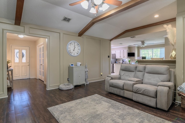 1317 Tiffany Ln, Longview, TX 75604 - living area with a ceiling fan, dark wood-style floors, and a decorative wall