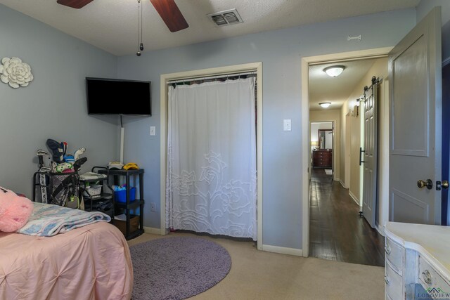 1317 Tiffany Ln, Longview, TX 75604 - bedroom with baseboards, carpet flooring, and ceiling fan